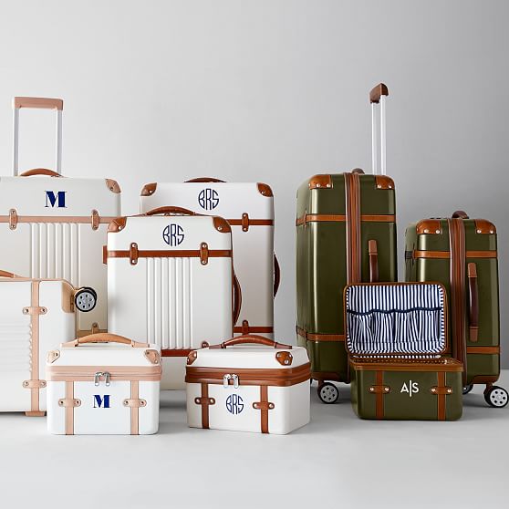 white and brown carry on luggage