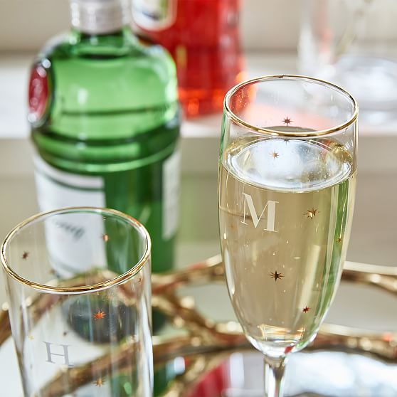 https://assets.mgimgs.com/mgimgs/ab/images/dp/wcm/202343/0006/gold-star-champagne-flutes-set-of-4-c.jpg