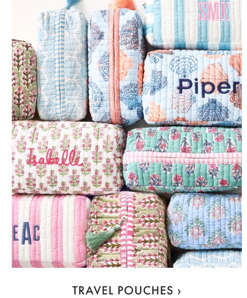 Travel Pouches >
