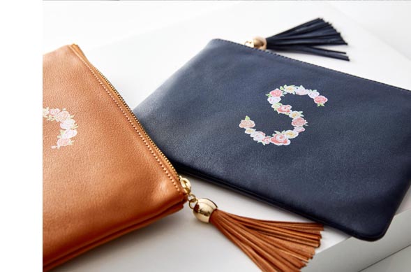 Leather Tassel Zipper Pouch >