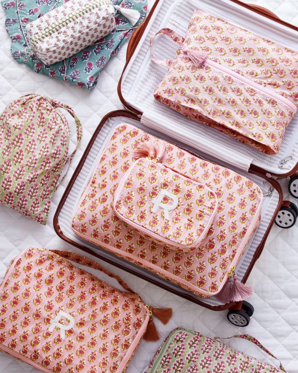 Shop Travel Accessories >