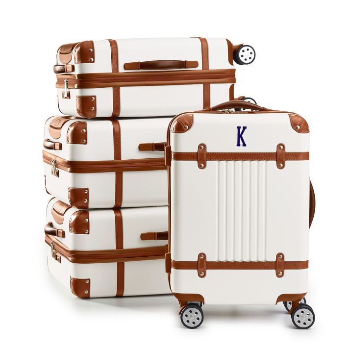 white brown luggage