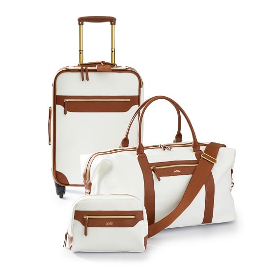 white leather luggage