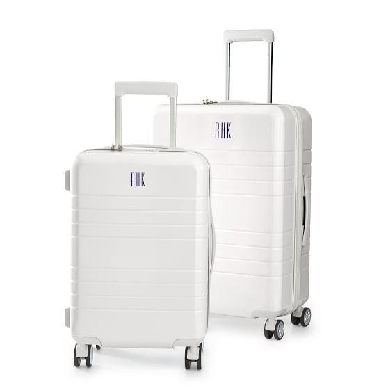 white checked luggage