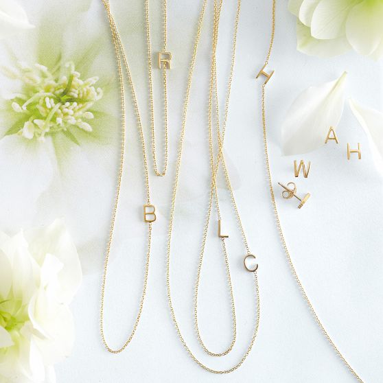 Asymmetrical multiple deals initial necklace