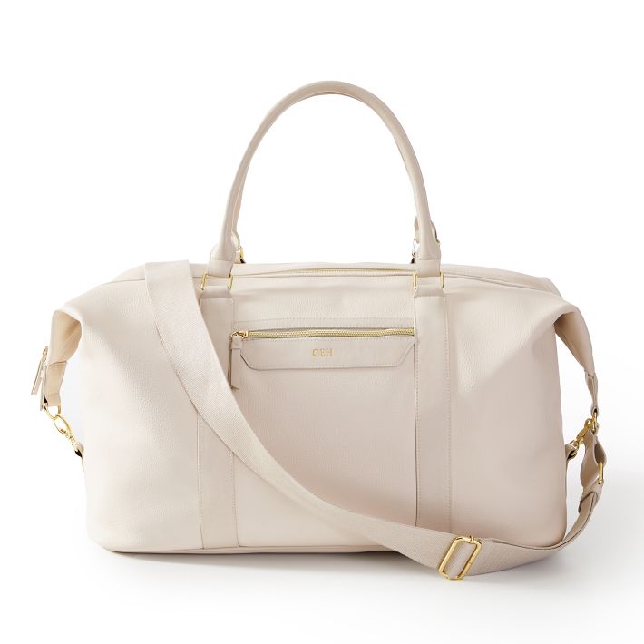 white leather weekender bag