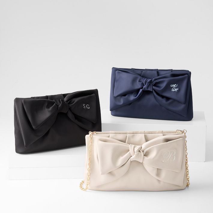 Black satin clutch bag with bow sale